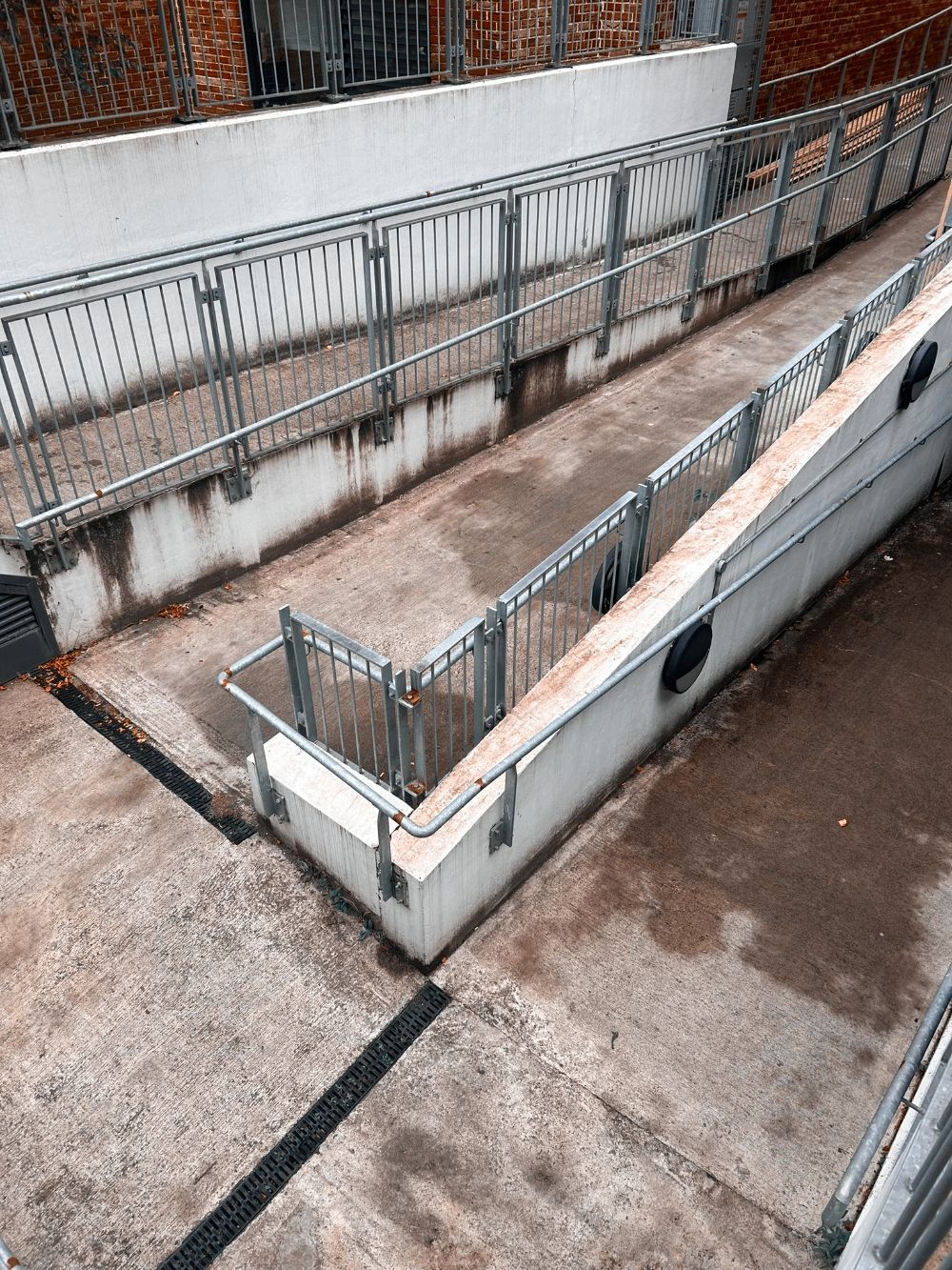 An aerial view of a ramp leading to a building.