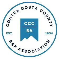 The logo for contra costa county bar association is a blue circle with a mountain in the middle.