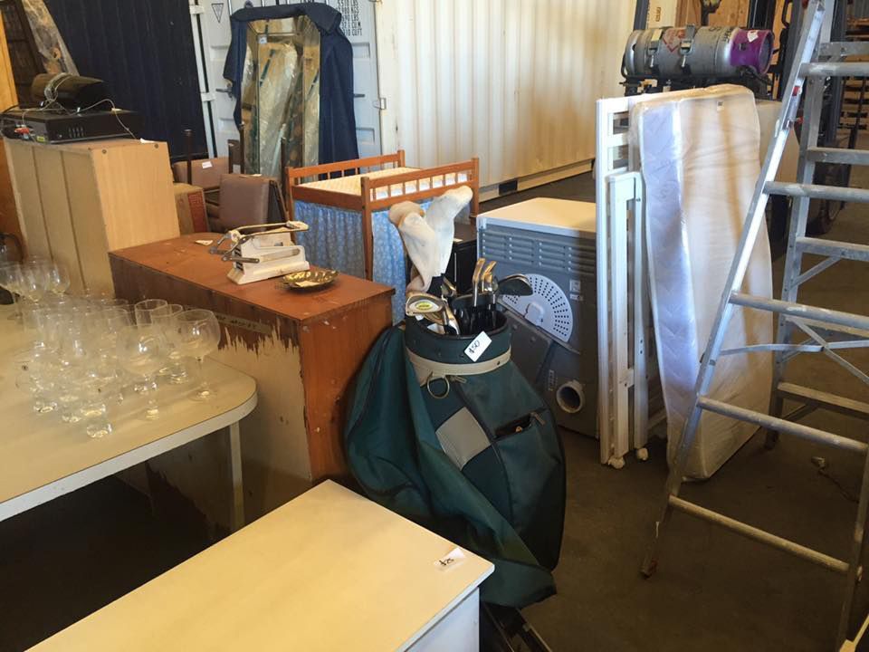 A Room Filled With Lots Of Furniture And A Ladder — Dawson Moving & Storage NQ in Mount St John, QLD