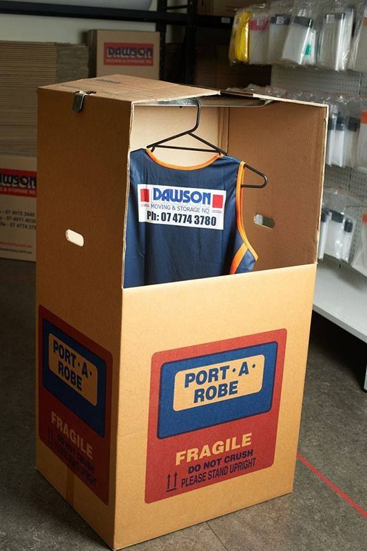 A Shirt In A Cardboard Box That Says Port A Robe — Dawson Moving & Storage NQ in Mount St John, QLD