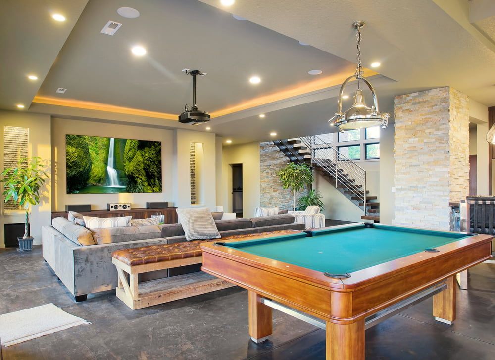 There Is A Pool Table In The Middle Of The Living Room — Dawson Moving & Storage NQ in Mount St John, QLD