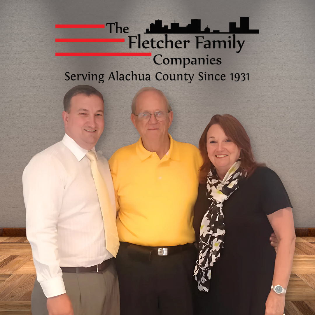 Three people posing: logo