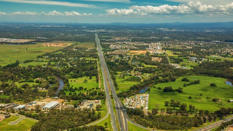 Aerial view of the Bruce Highway through Caboolture, Queensland, showing established suburbs