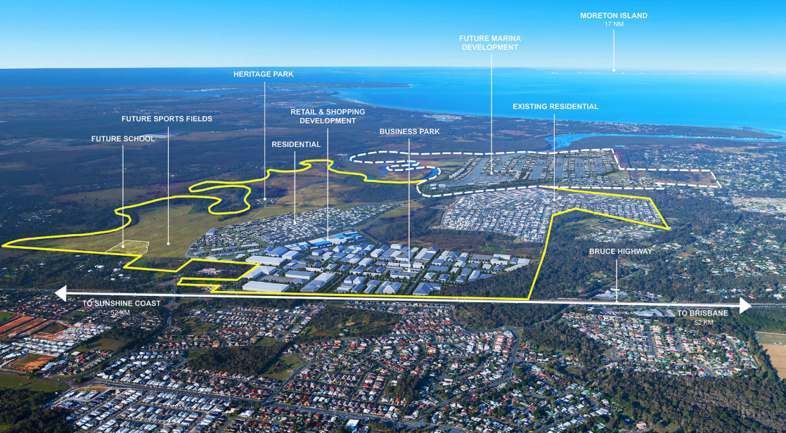 Aerial view of North Harbour Marina outlined in yellow along a coastline under a blue sky.