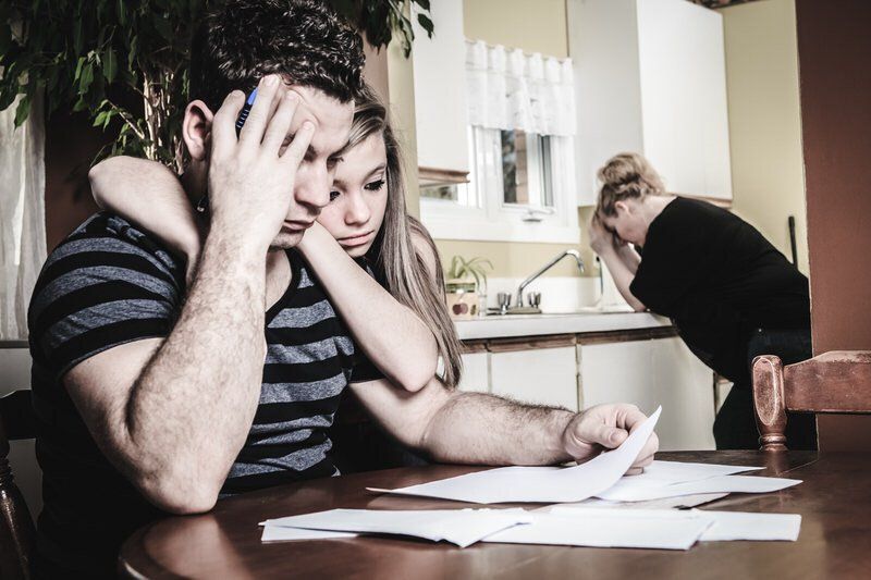 A family falling into depression due to financial crisis.