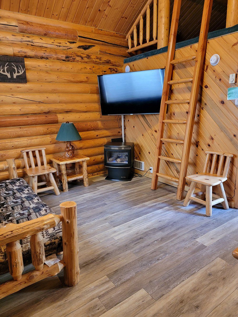 A living room with wooden furnitures