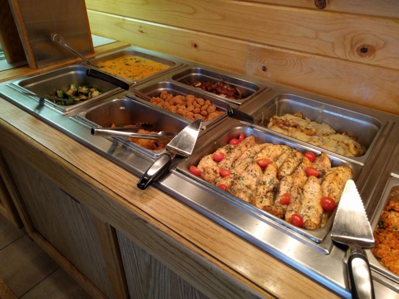 Different kind of food in serving dishes