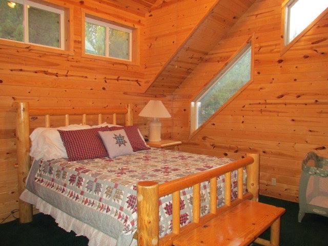 Bed with a  wooden frame