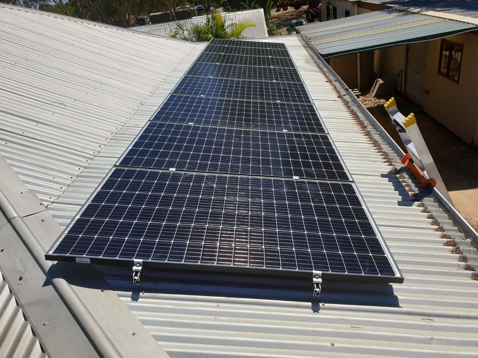 A roof with a lot of solar panels on it