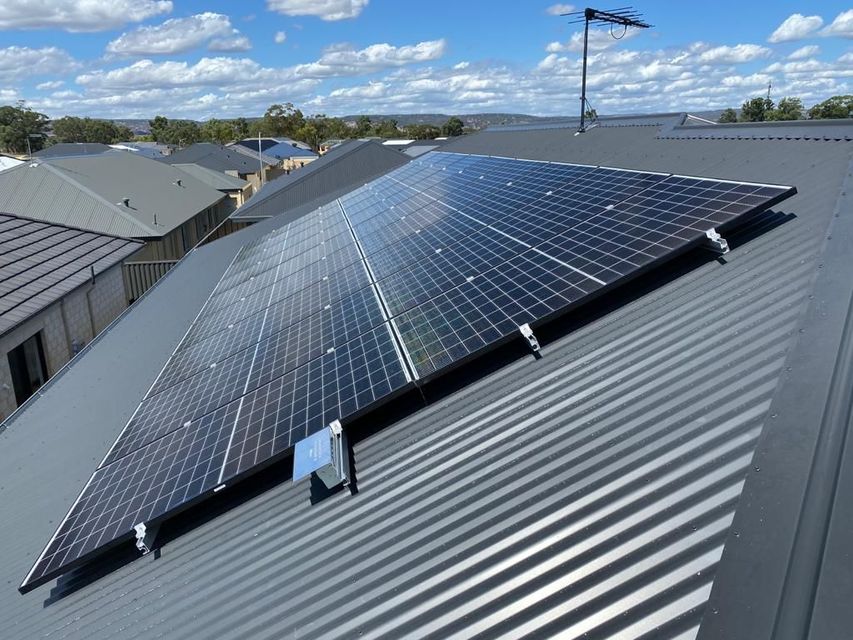 A roof with a lot of solar panels on it.