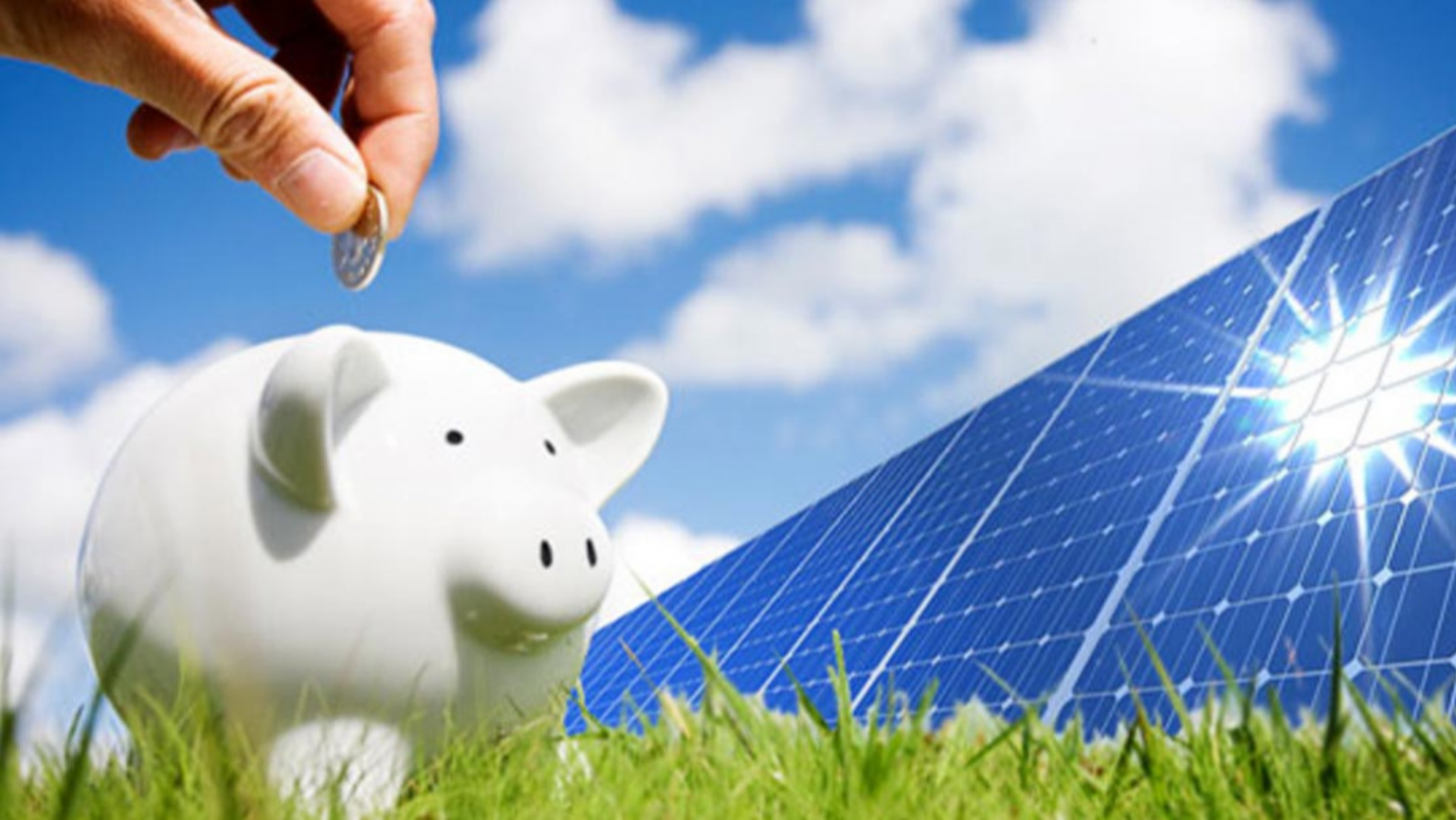 A person is putting a coin into a piggy bank in front of a solar panel.