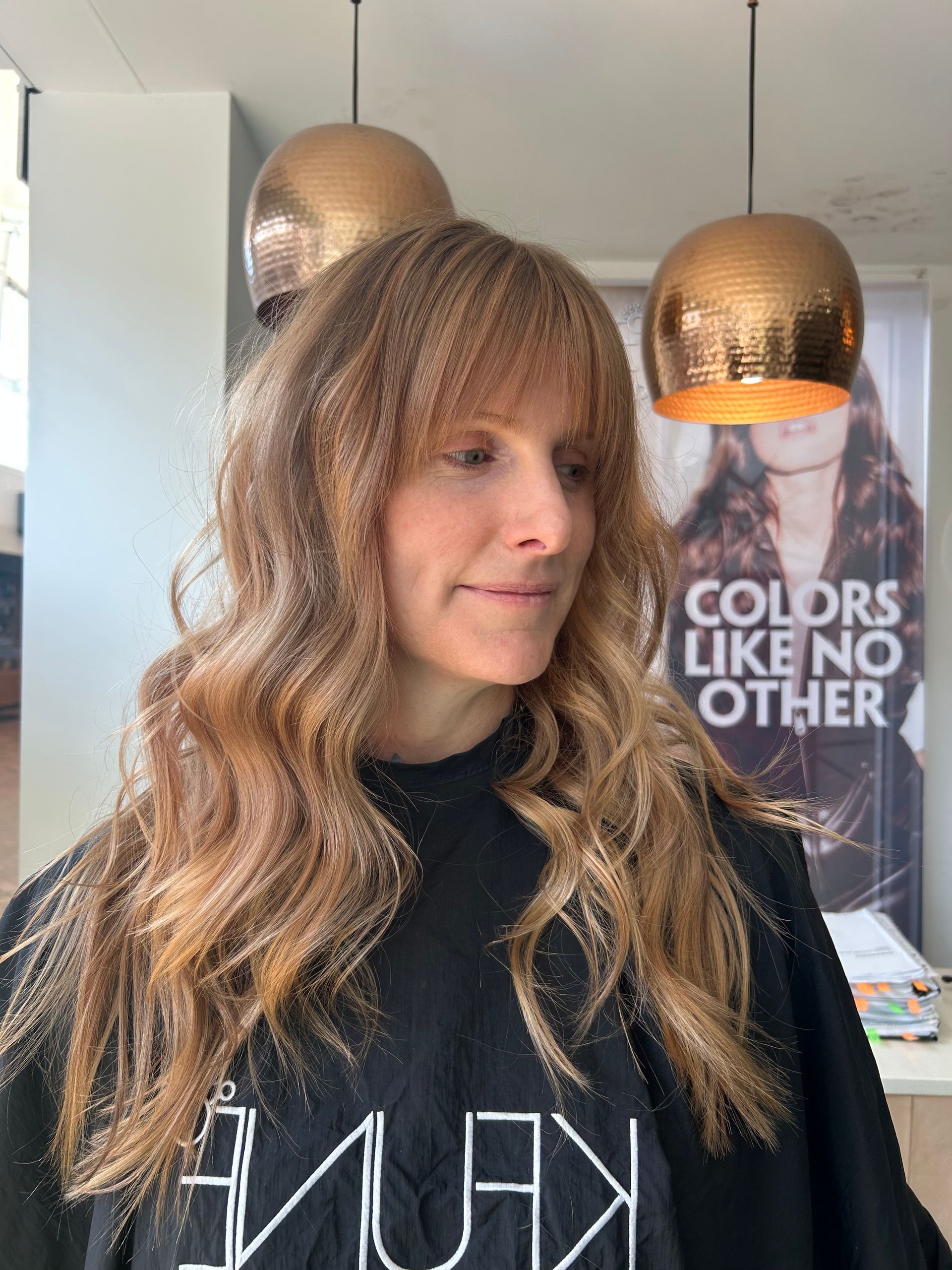 A Woman With Pink Hair Is Standing In A Salon — Hair By Jell In Cannonvale, QLD