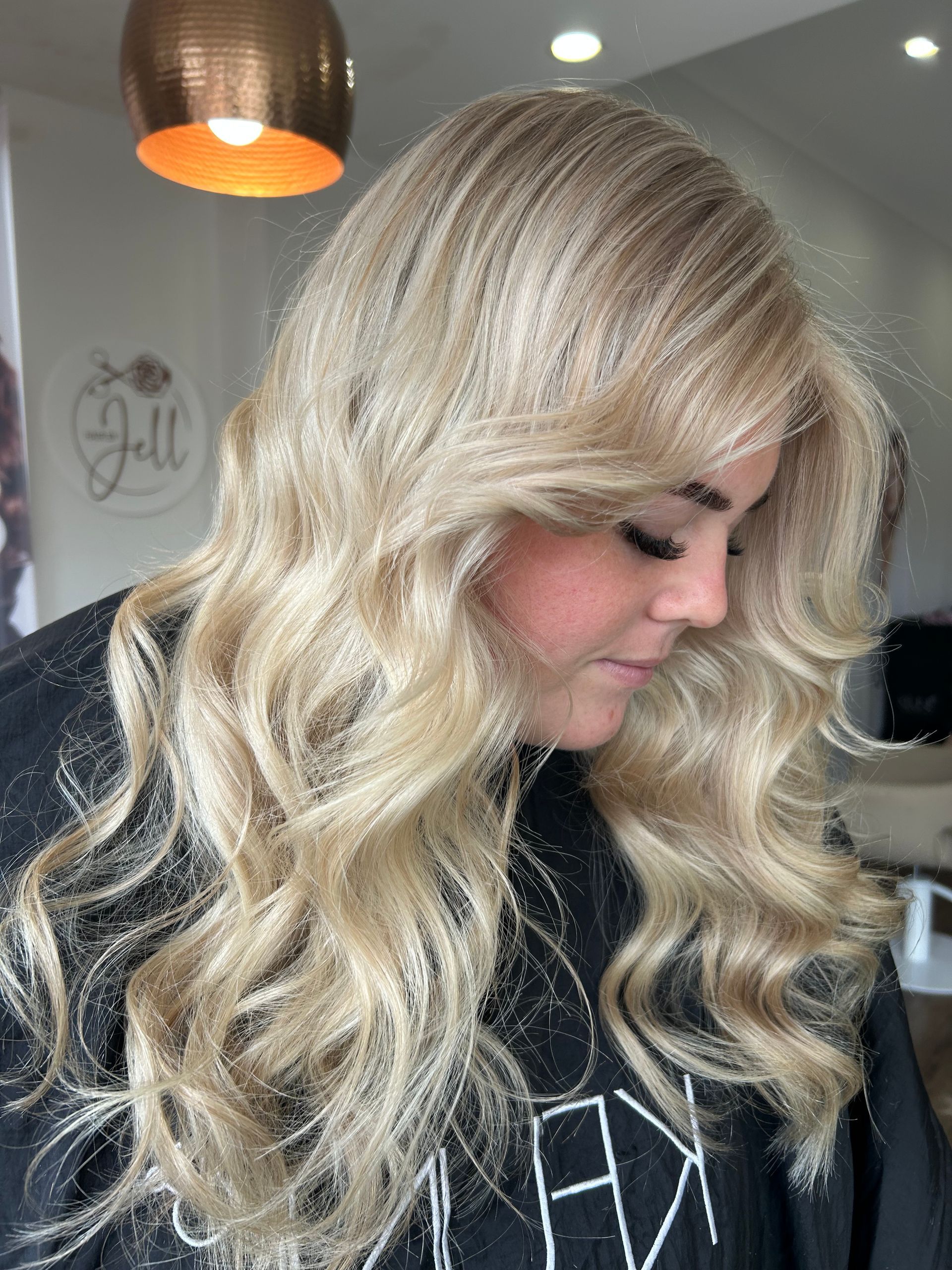 A Close Up of a Woman's Face and Hair — Hair By Jell In Cannonvale, QLD