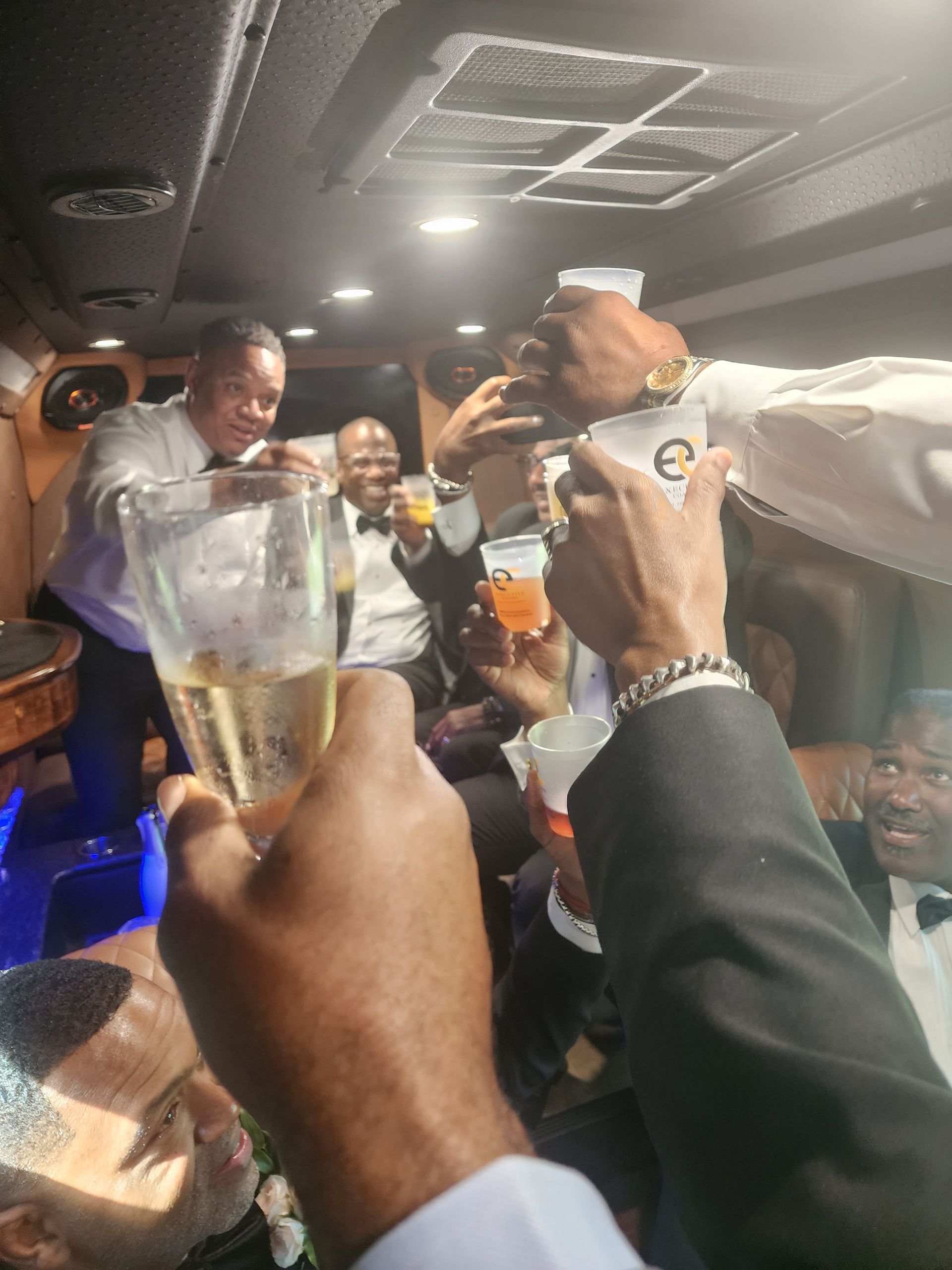 Guests celebrating during chauffeured event transportation in Memphis
