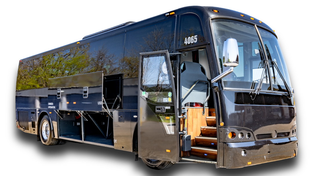 Black charter bus with open doors and storage compartments.
