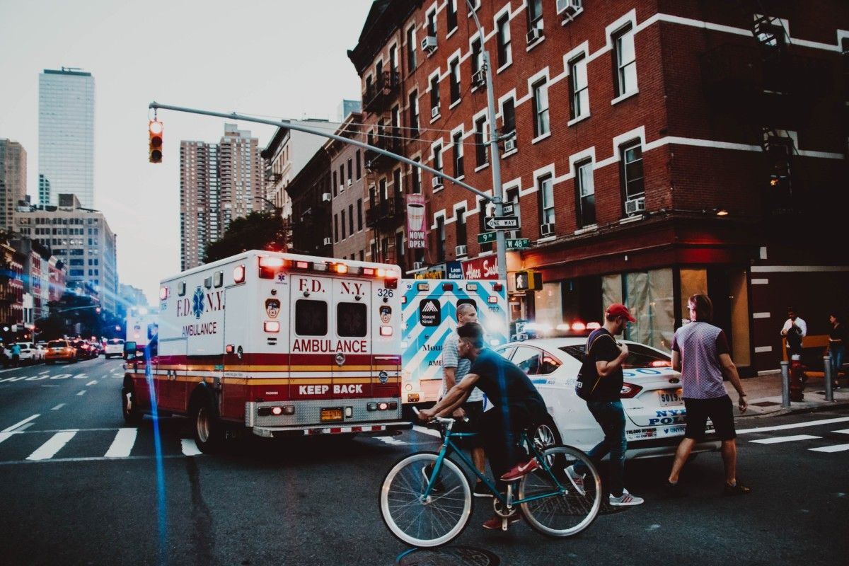 ambulance driving on street in new york city