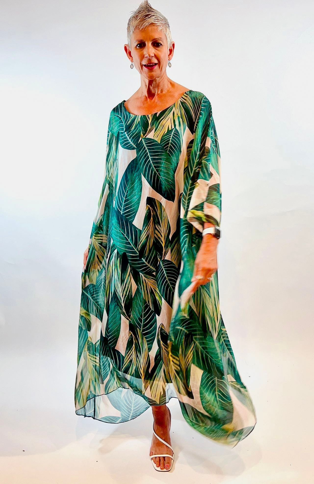 A Blond Lady In A Green Dress - Women's Clothing in Darwin