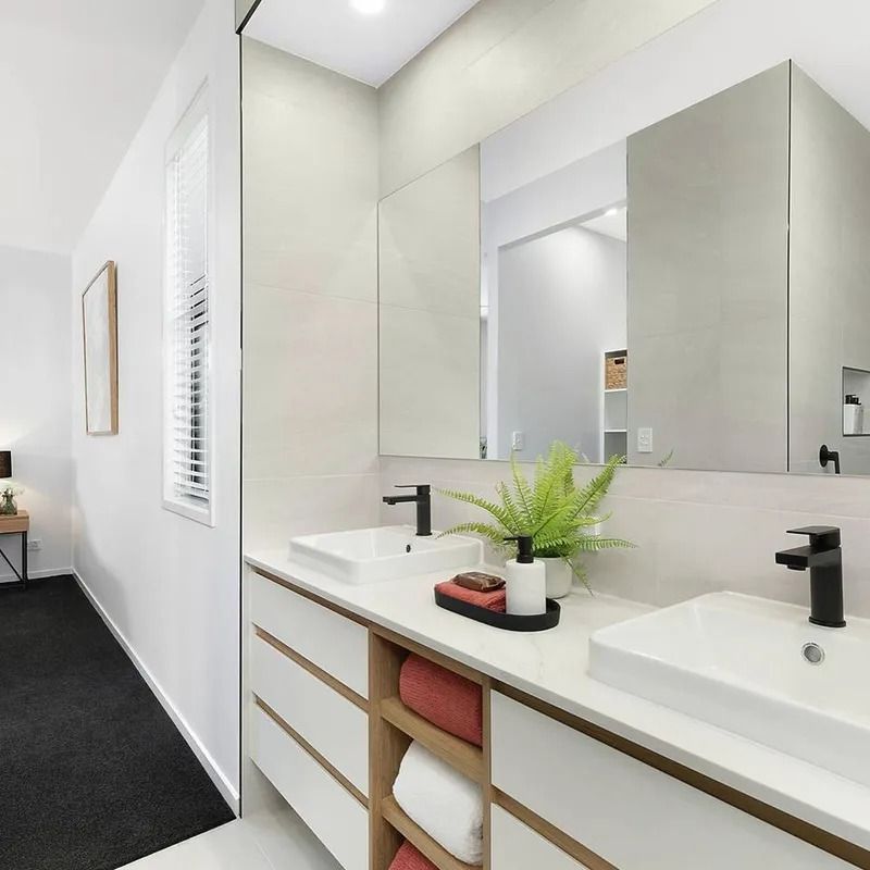 A Bathroom With Two Sinks And A Large Mirror — Norm Evans Floors Pty Ltd in Kunda Park, QLD
