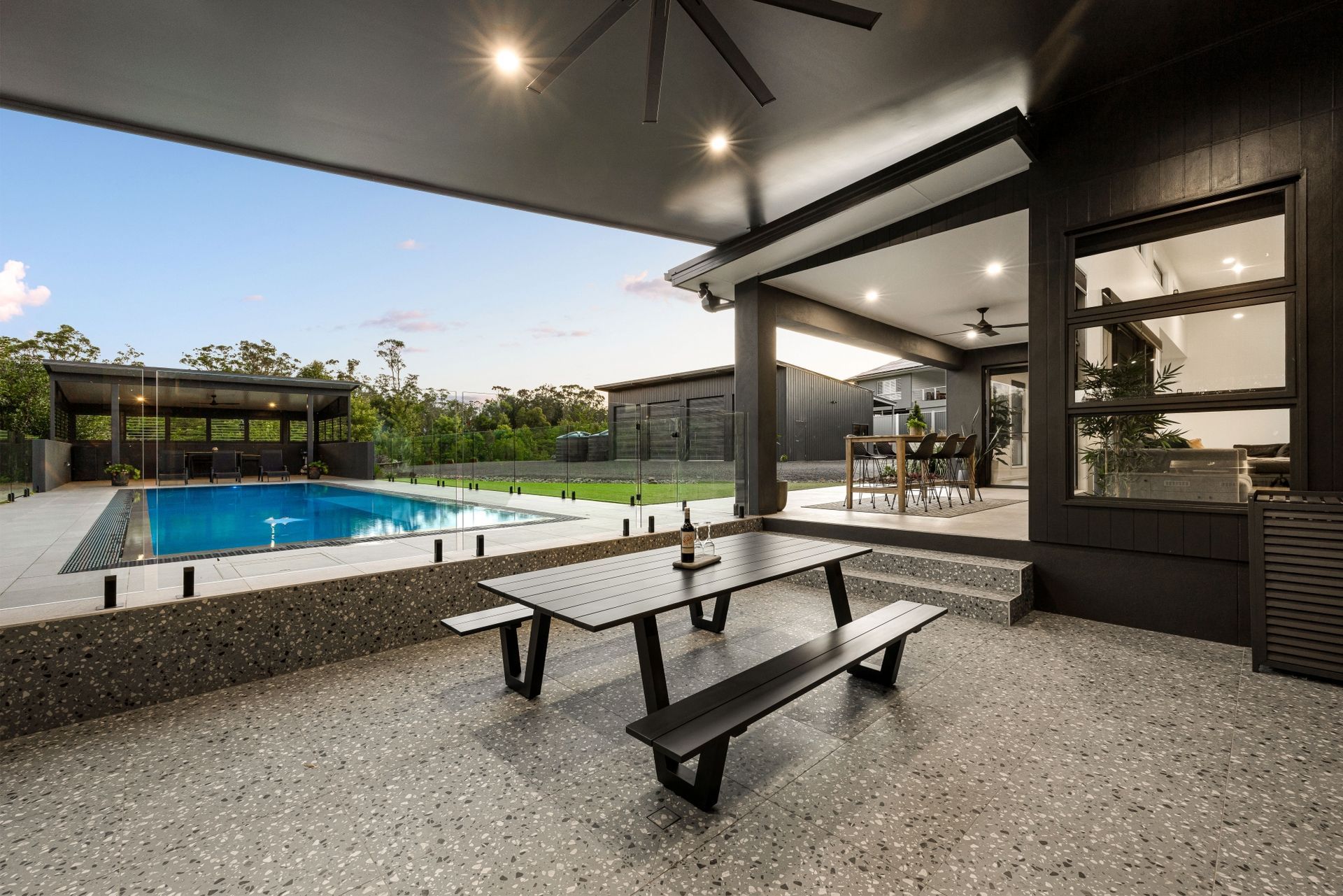 A Wooden Floor With A Geometric Pattern And Pillows On It — Norm Evans Floors Pty Ltd in Kunda Park, QLD