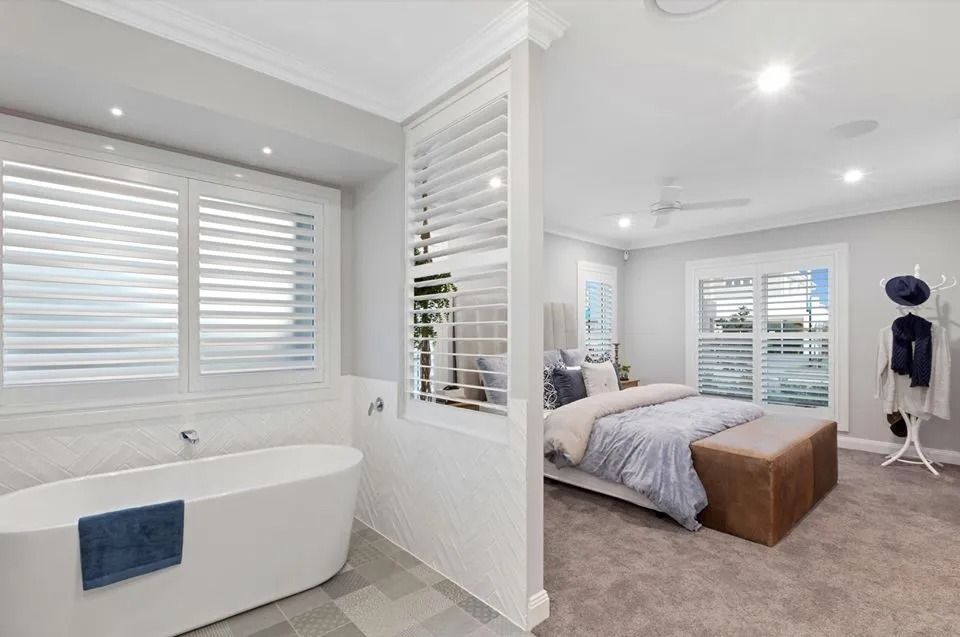 There Is A Bathtub In The Middle Of The Bedroom — Norm Evans Floors Pty Ltd in Kunda Park, QLD