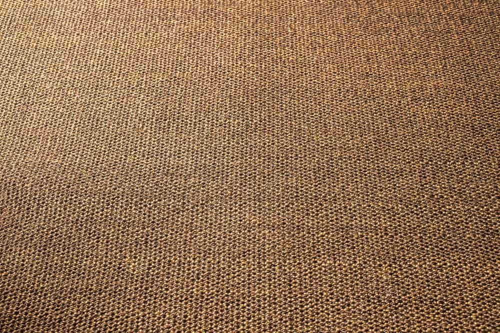 Close-up view of textured, woven, brown fabric.