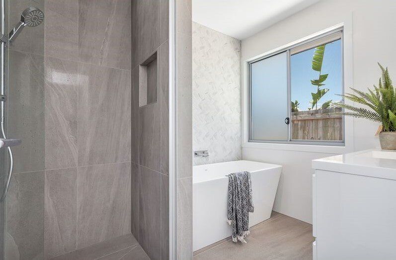 A Walk In Closet With Lots Of Shelves And Drawers — Norm Evans Floors Pty Ltd in Kunda Park, QLD
