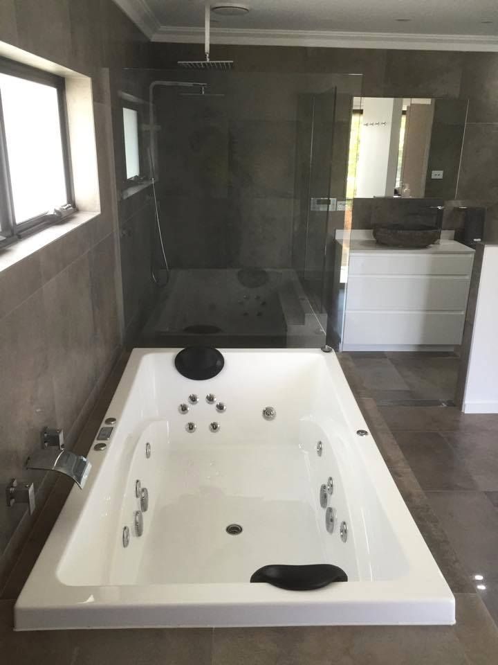 Spacious bathtubs offering ample relaxation — Corrimal Discount Tiles and Bathroomwear in East Corrimal, NSW