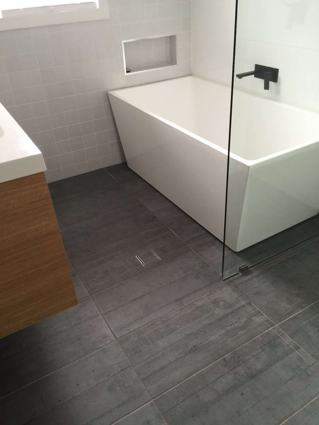 Explore our exquisite range of rectangular baths, perfect for enhancing your bathroom with a touch of elegance and functionality — Corrimal Discount Tiles and Bathroomwear in East Corrimal, NSW
