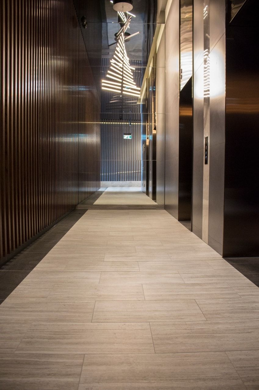 Explore exquisite floor tiling in the elevator corridor — Tiles in East Corrimal, NSW