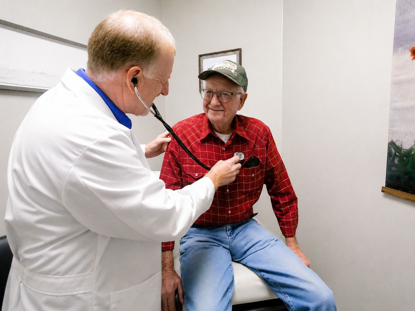 Cecil Massey, APRN, examining an older adult patient at Carriage Hill Family Care