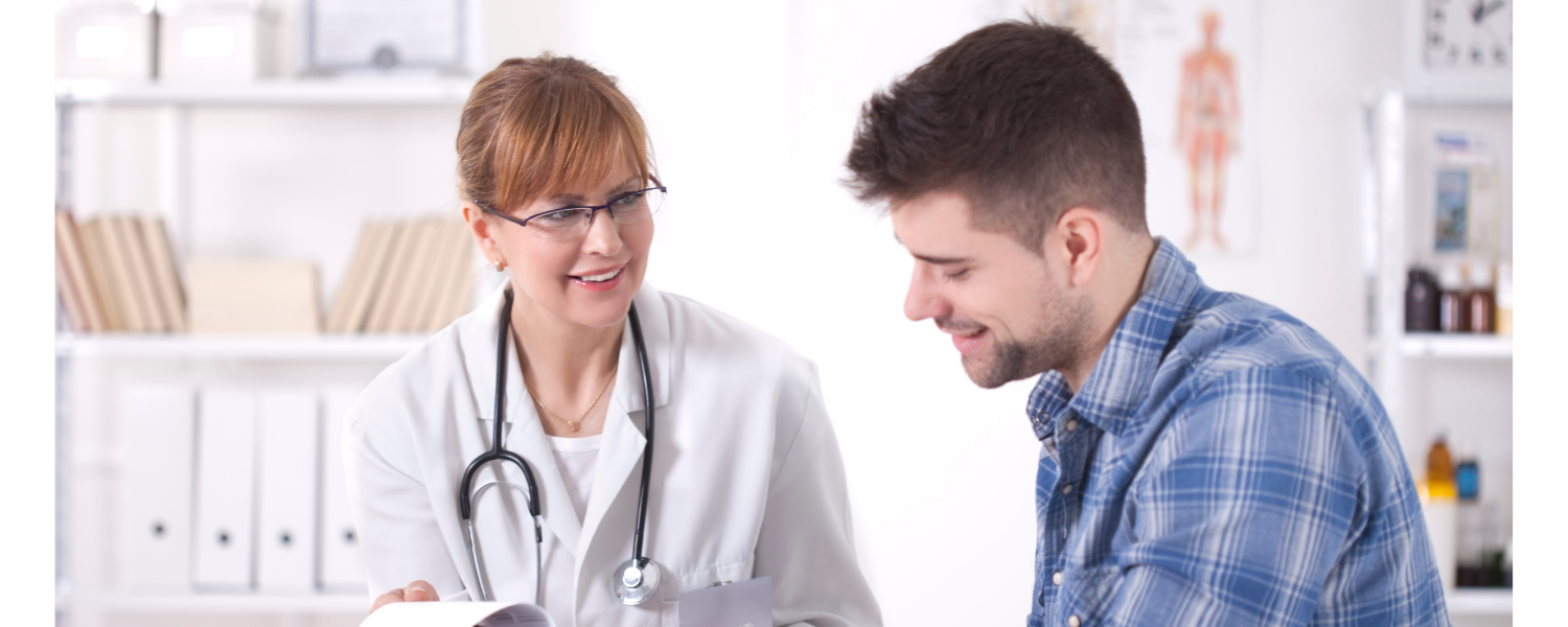 Doctor talking with a patient in a bright clinic office