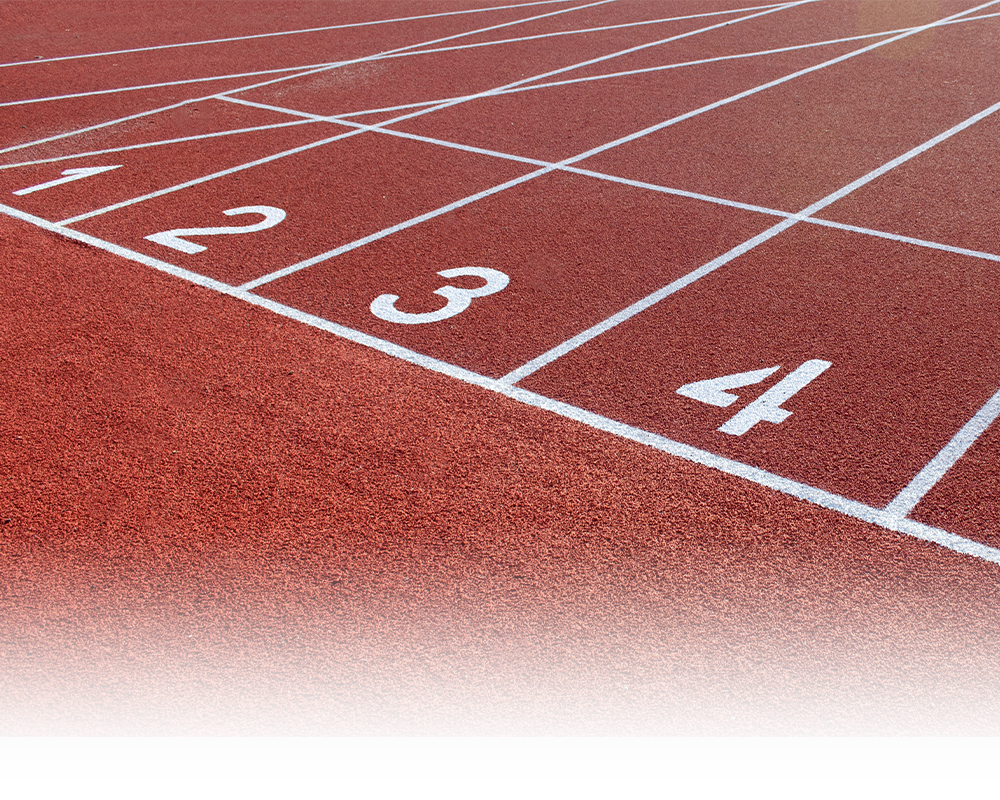 A running track with the numbers 1 through 4 painted on it