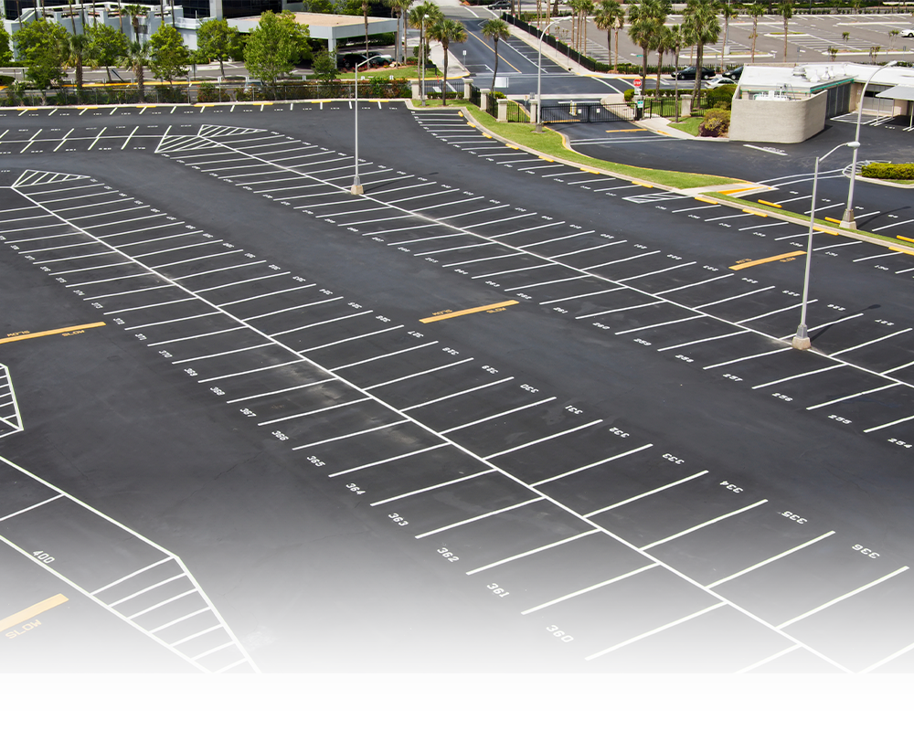 a parking lot with numbered bays