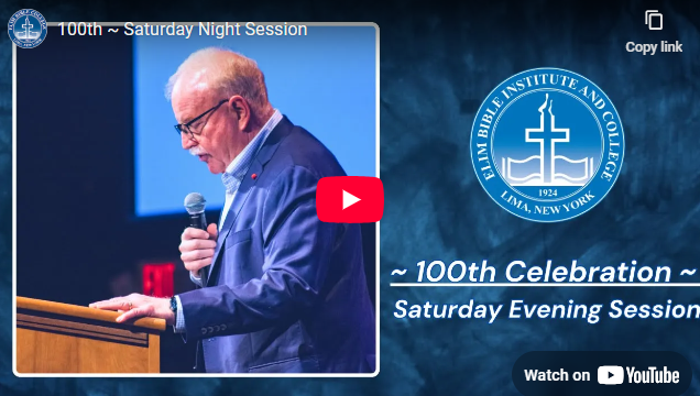 A man speaking at a lectern during a Saturday evening celebration at �鶹��Ƶ Bible Institute & College.