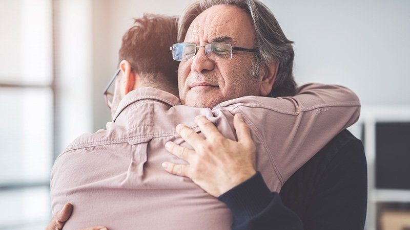Father and Son hug