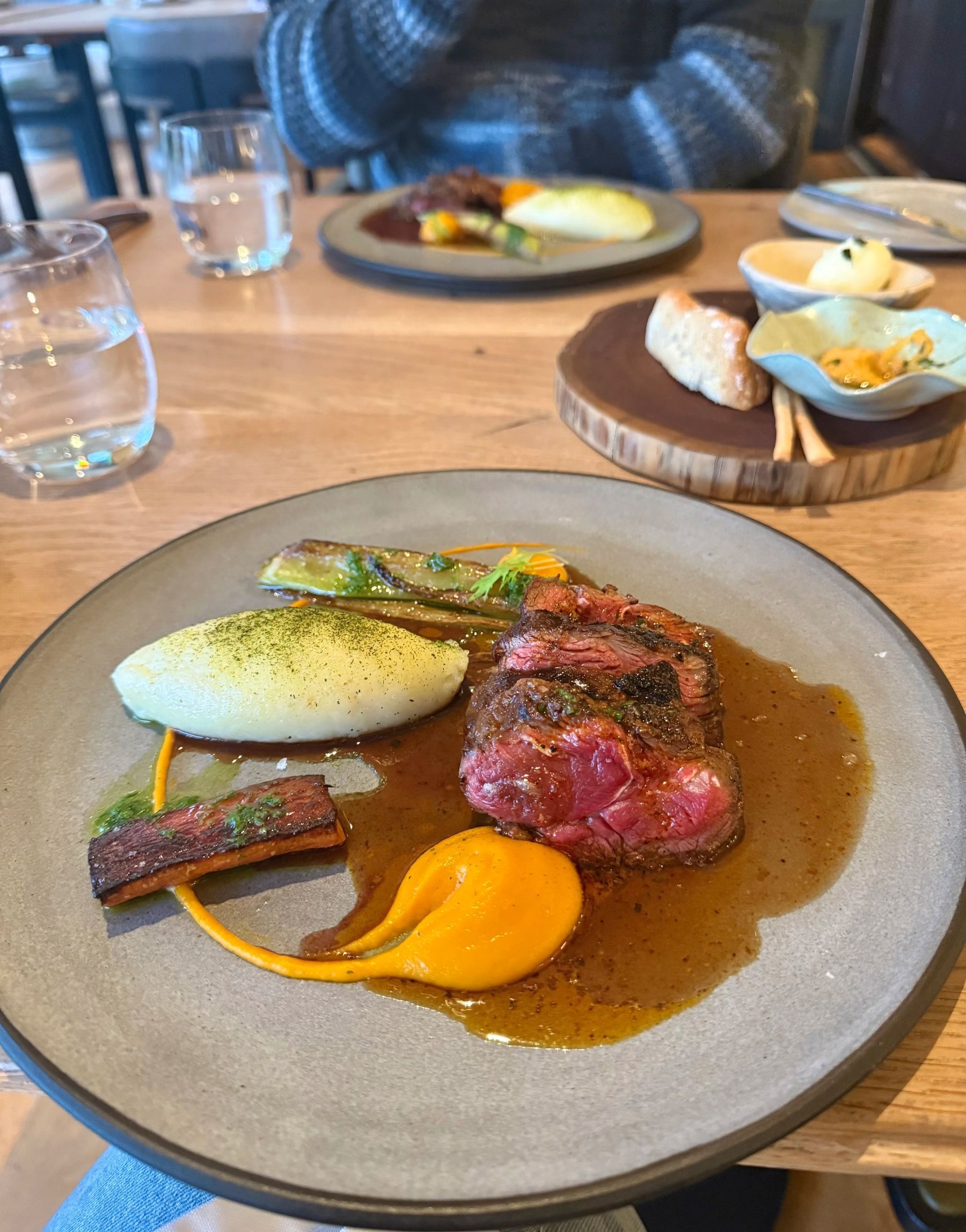 Dry aged rump with bone marrow jus and seasonal vegetables at Beyond