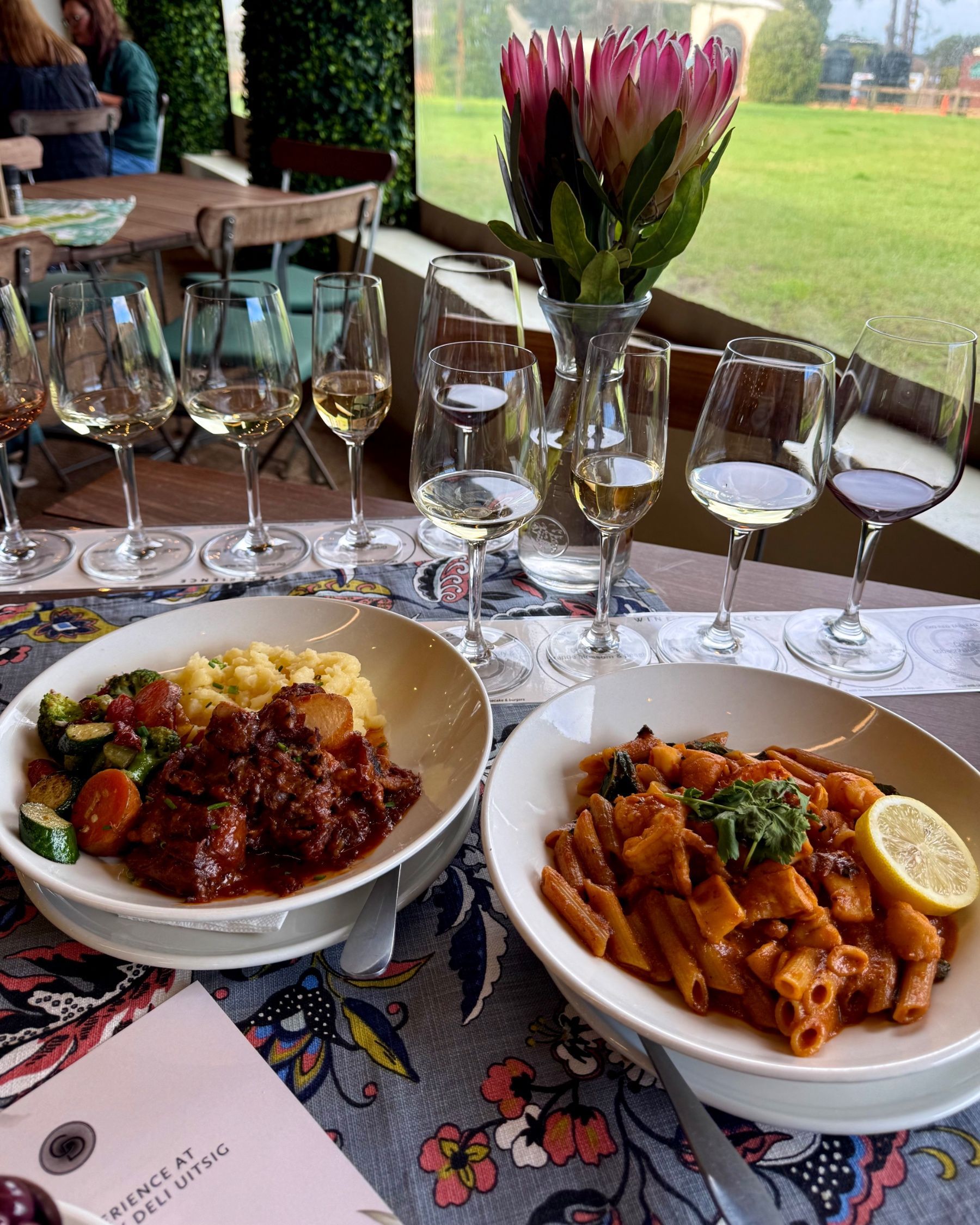 Seafood penne pasta, oxtail, bread and wine at Chardonnay Deli Uitsig
