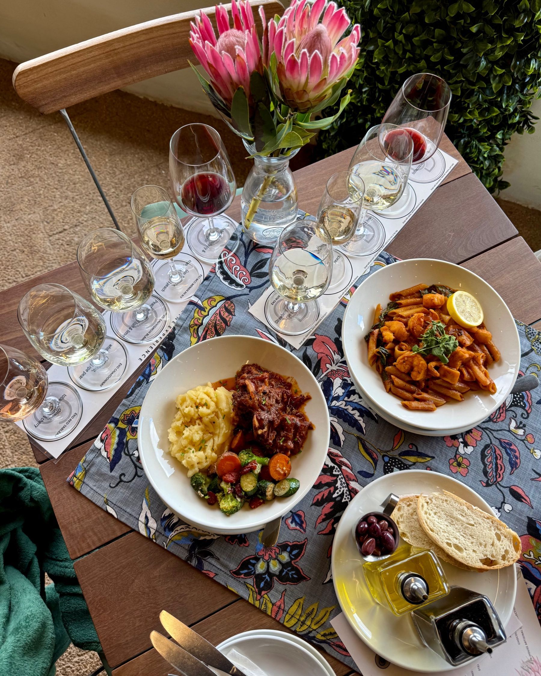 Seafood penne pasta, oxtail, bread and wine at Chardonnay Deli Uitsig