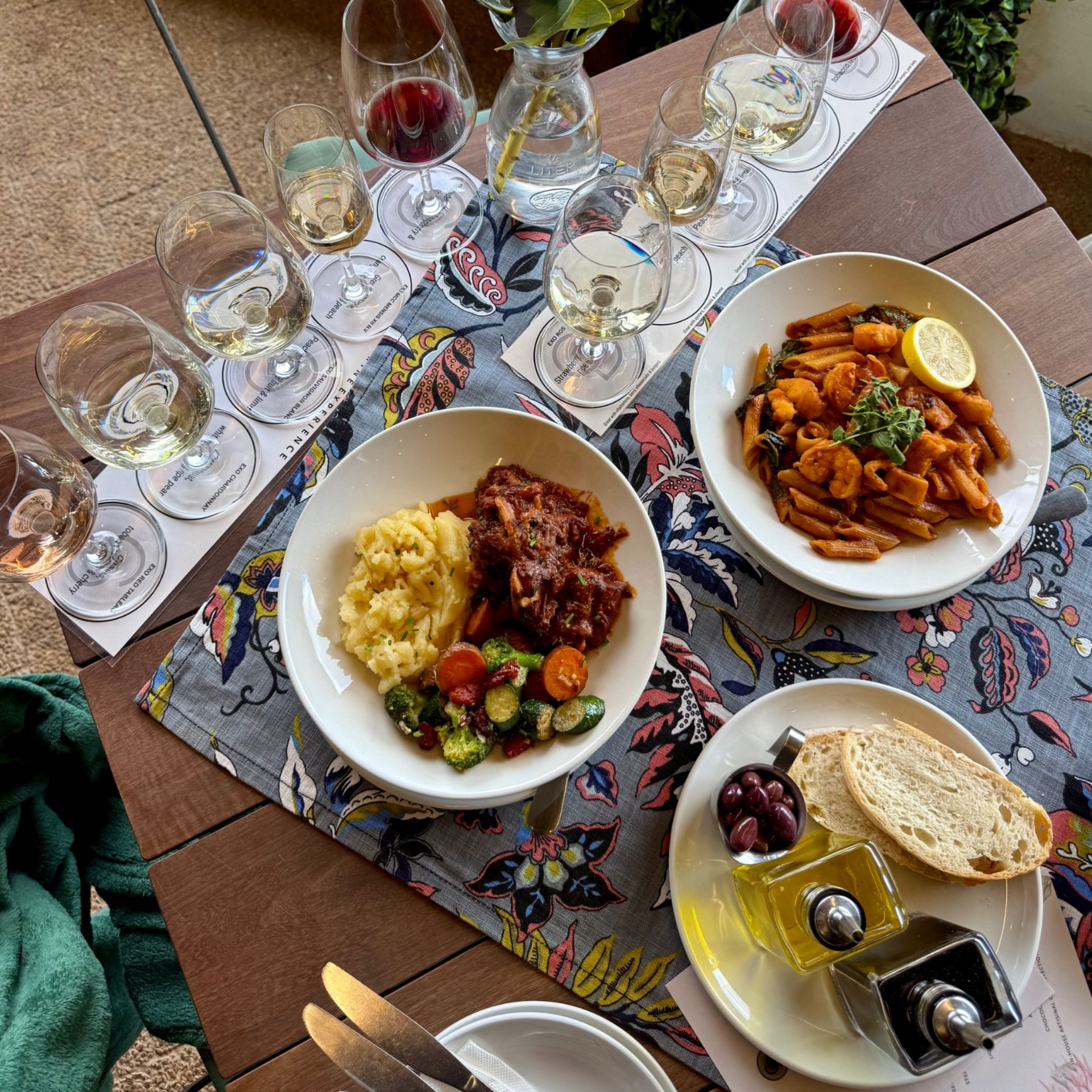 Seafood penne pasta, oxtail, bread and wine at Chardonnay Deli Uitsig