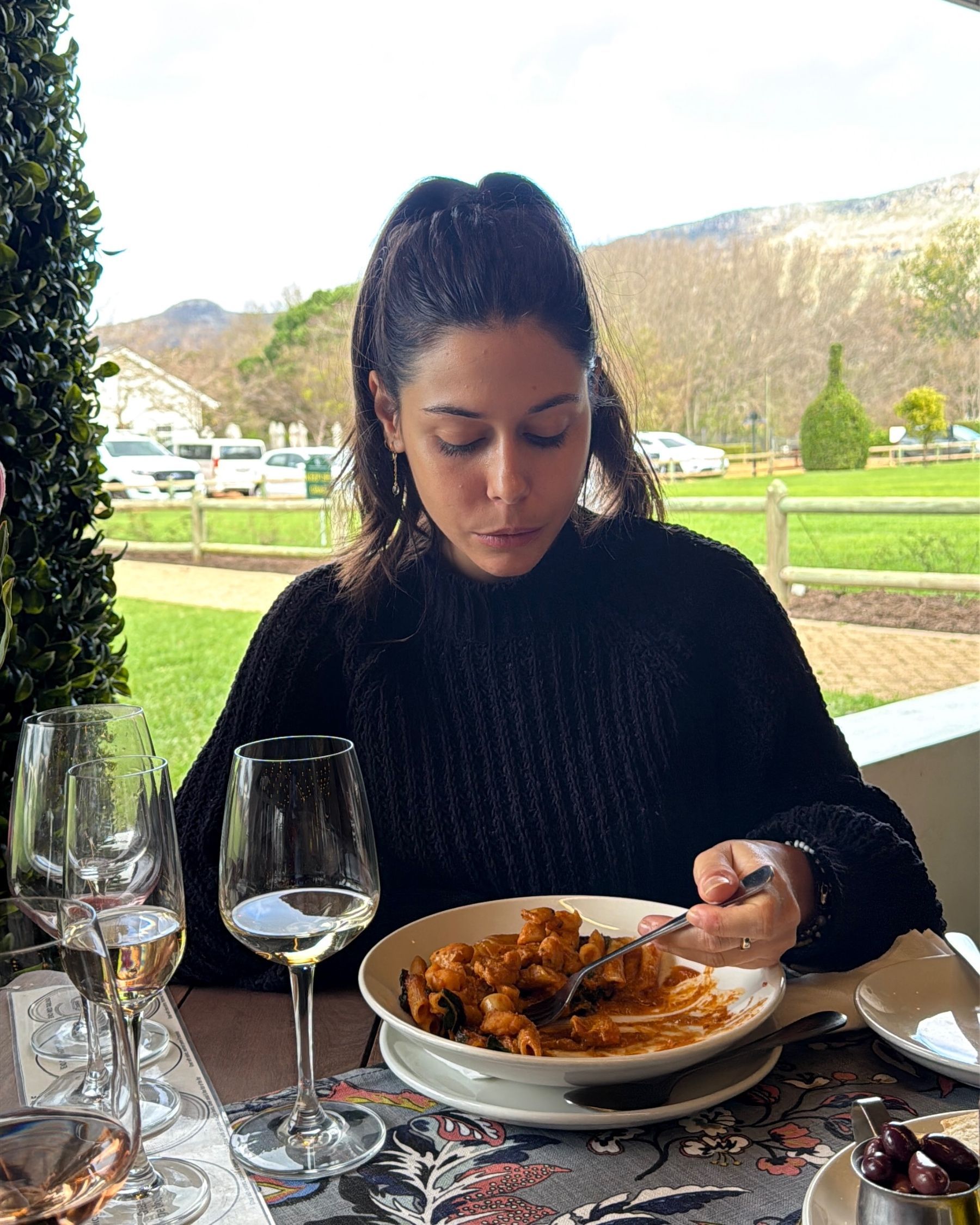 Paige is enjoying seafood pasta at Chardonnay Deli Uitsig
