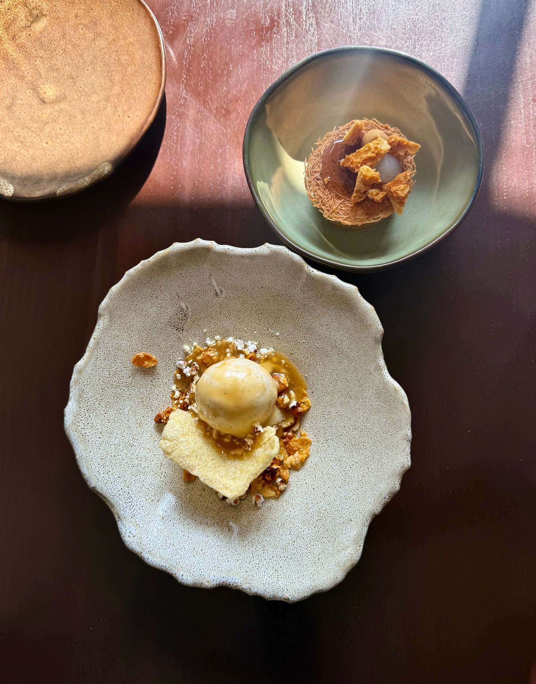 Assorted plated desserts at Chefs Warehouse & Canteen with layered textures and modern presentation.