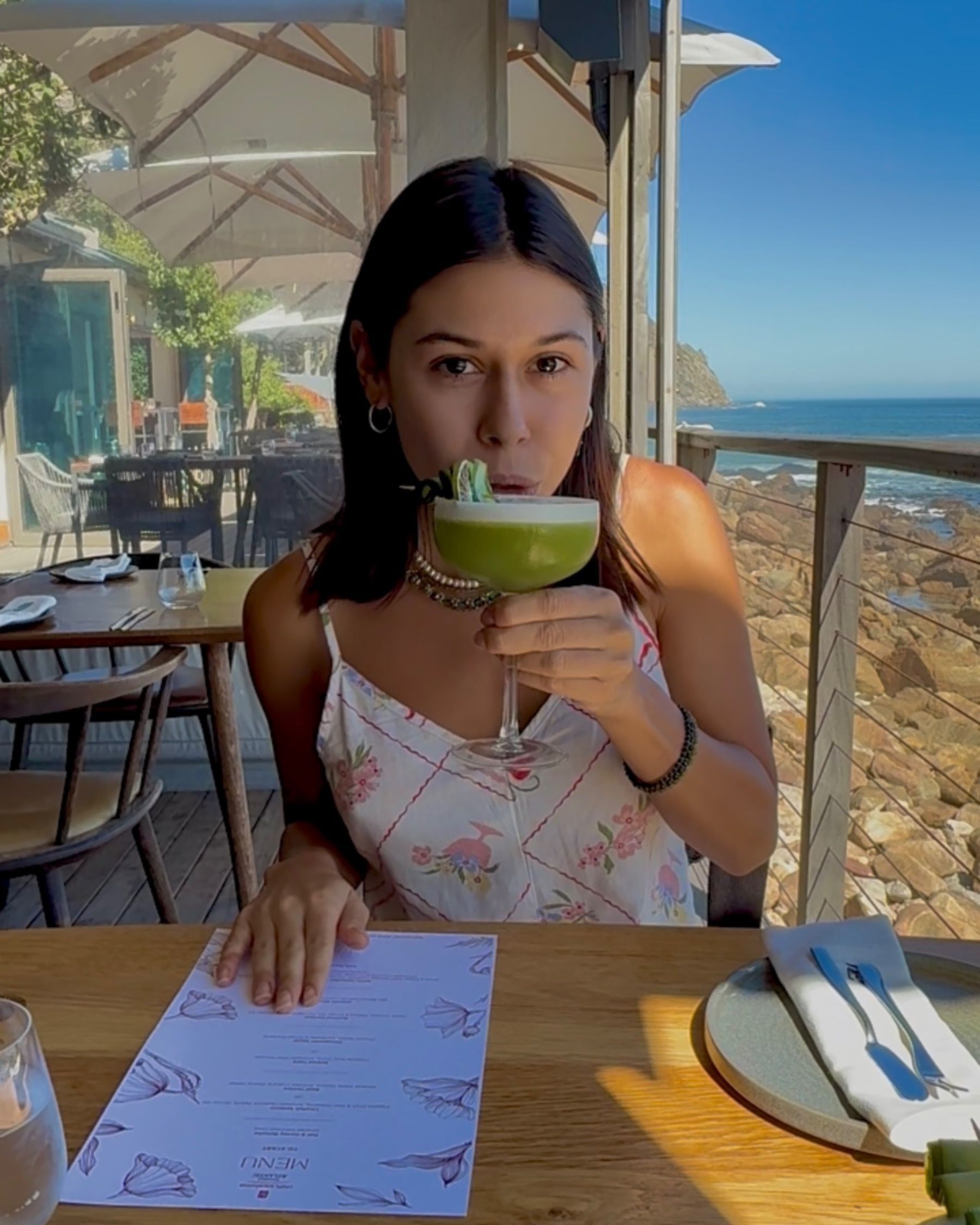 Paige sipping a mocktail at Chef’s Warehouse Tintswalo
