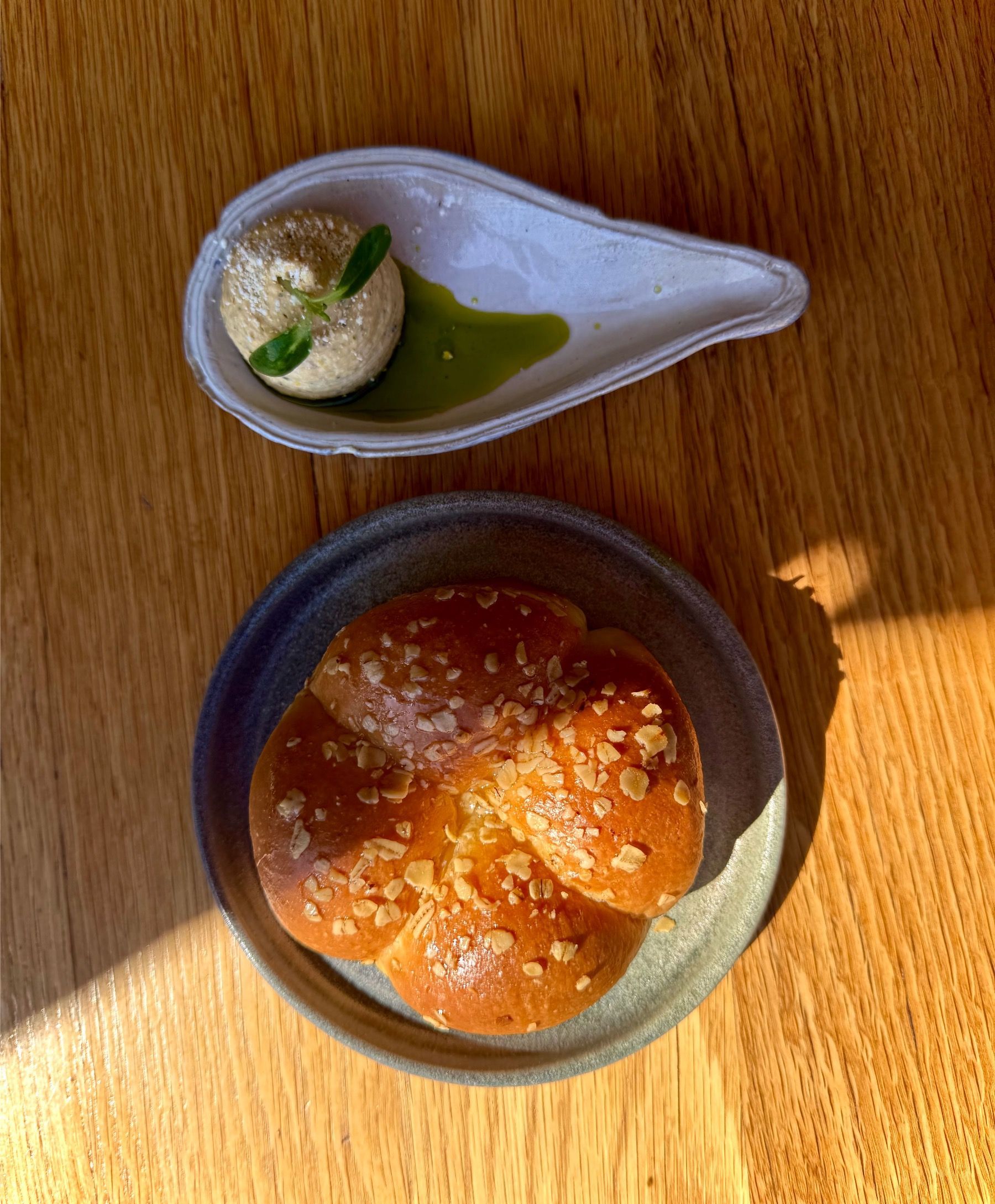 Honey and oat brioche at Chef’s Warehouse Tintswalo, served warm with dip
