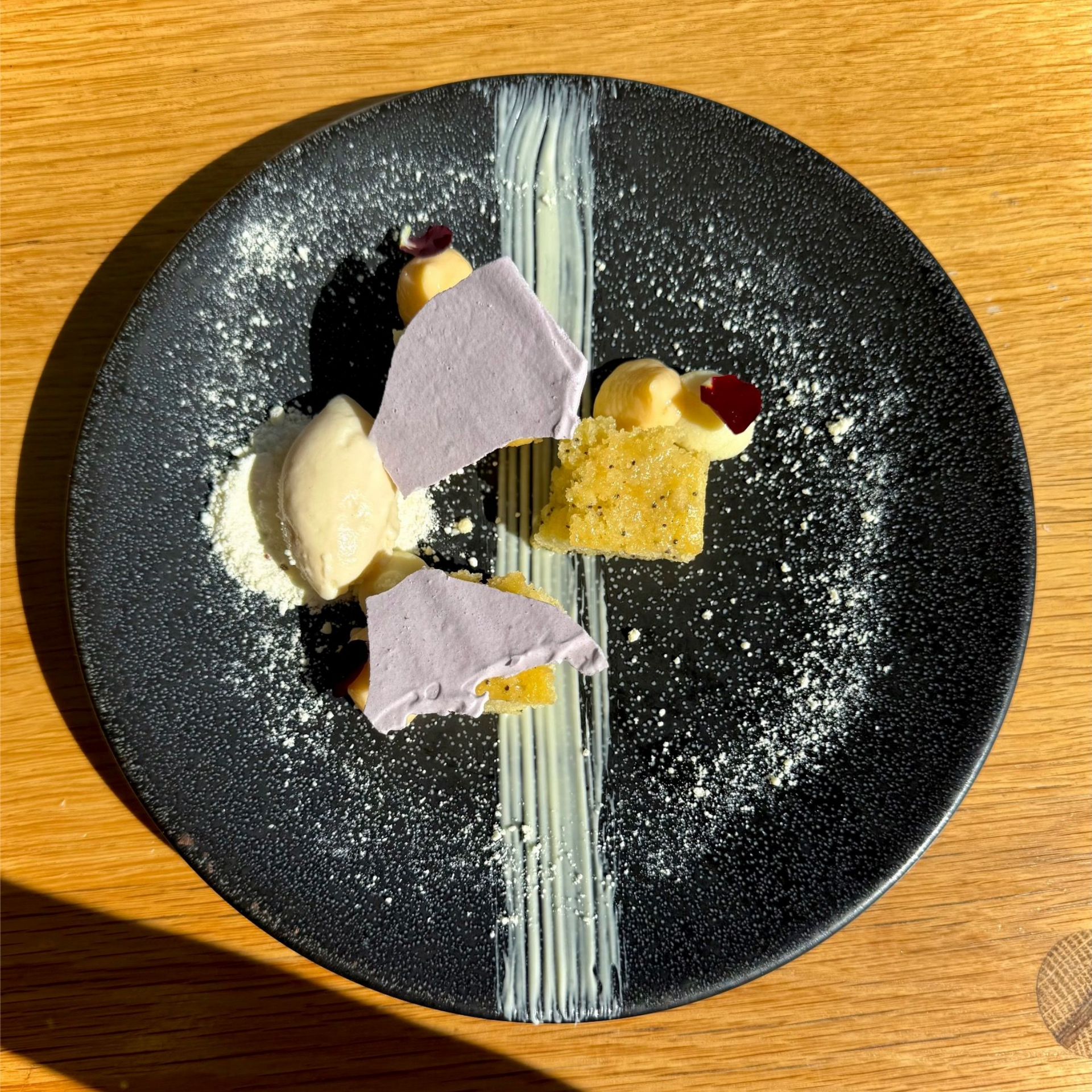 White chocolate and lemon dessert plated at Chef’s Warehouse Tintswalo