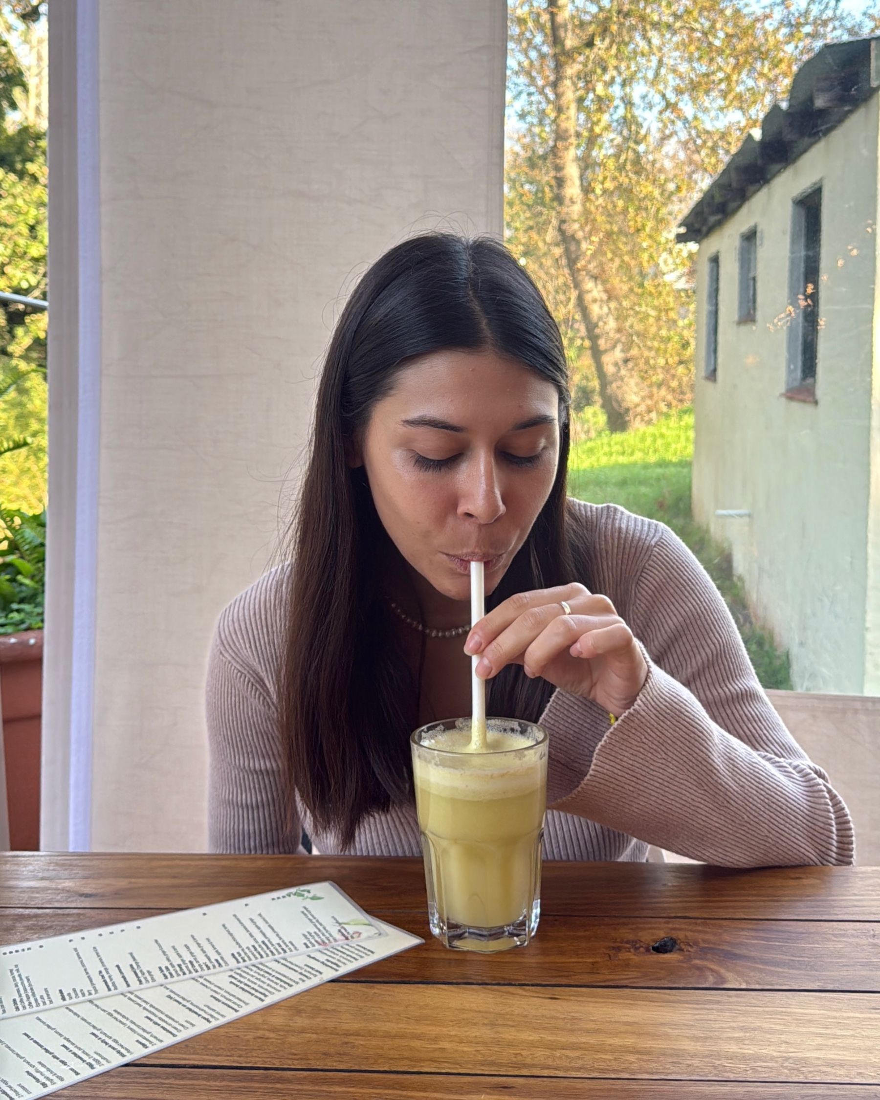 Paige enjoying the Super C juice at Chardonnay Deli High Constantia
