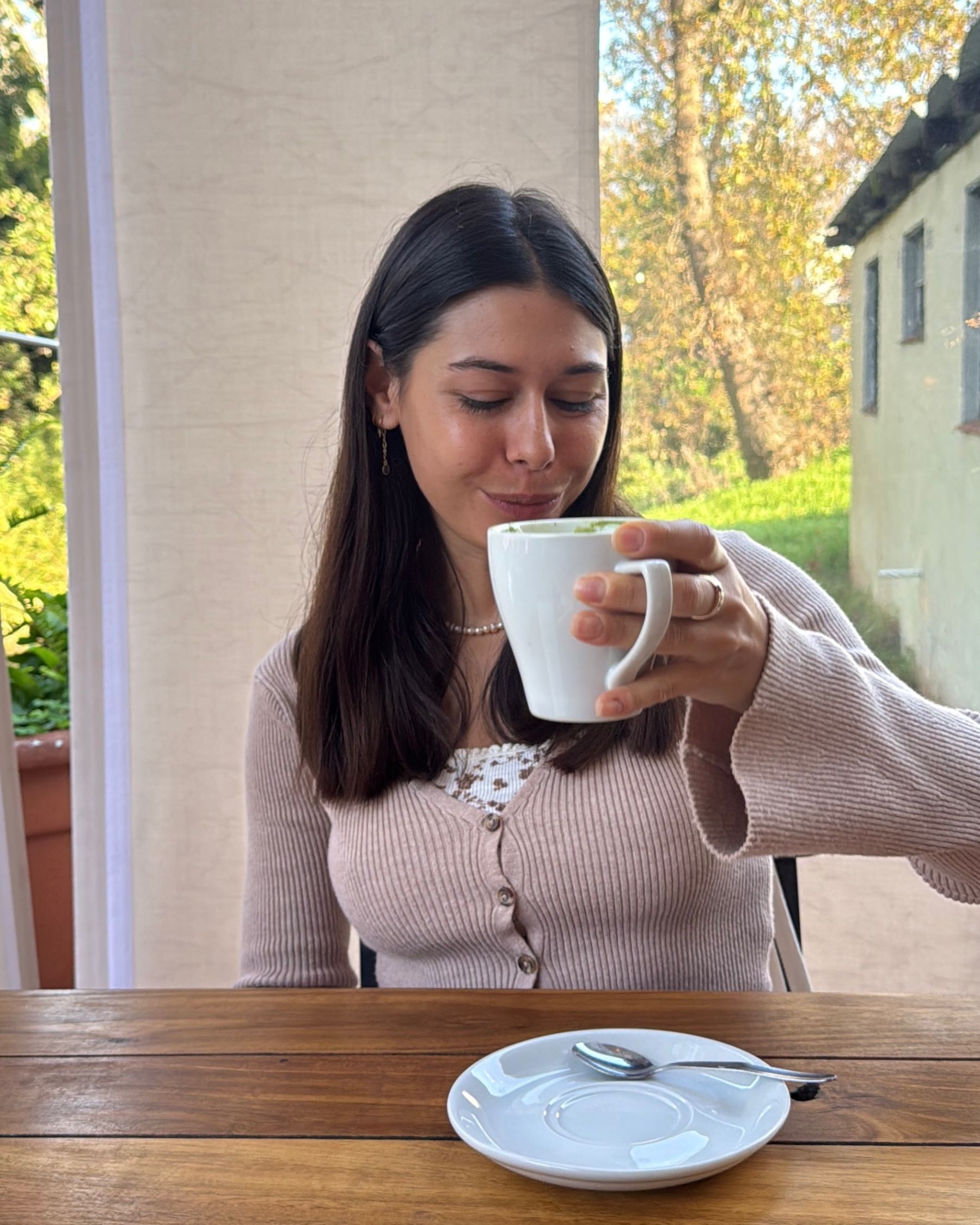 Paige enjoying a matcha latte at Chardonnay Deli High Constantia
