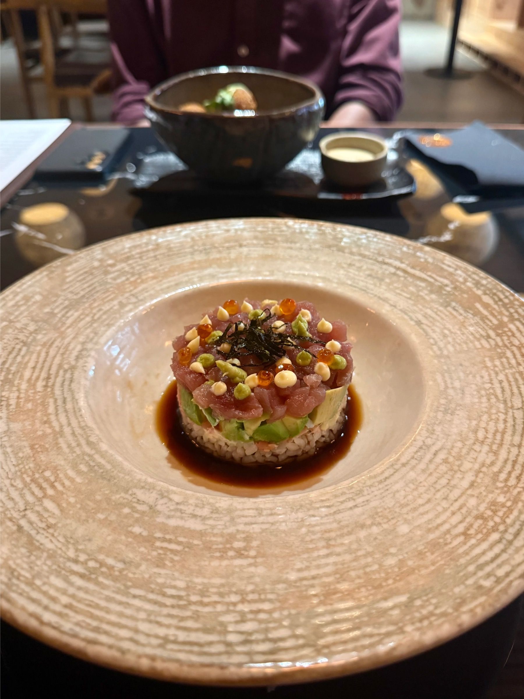 Fresh fish nigiri with tuna, avocado, rice and light ponzu at East City Grill Cape Town
