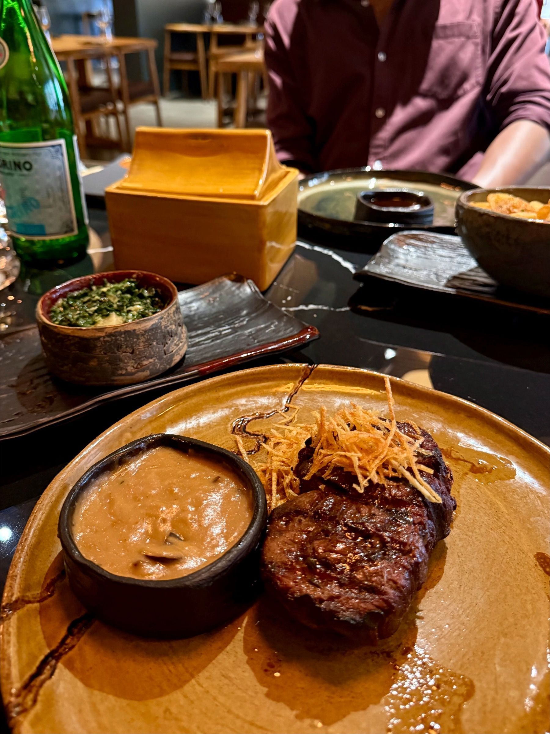 Medium-rare fillet brushed with wagyu fat, exotic mushroom sauce and creamed spinach with pear