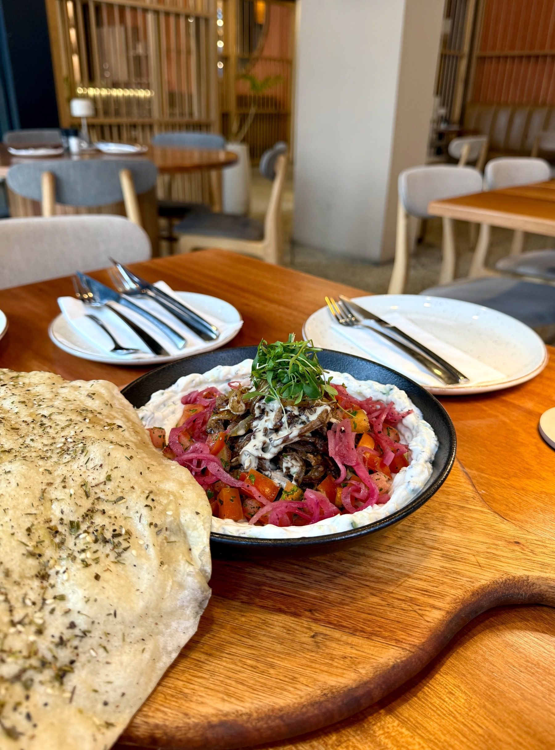 Kwama dish plated at Florentin with bold Middle Eastern flavours
