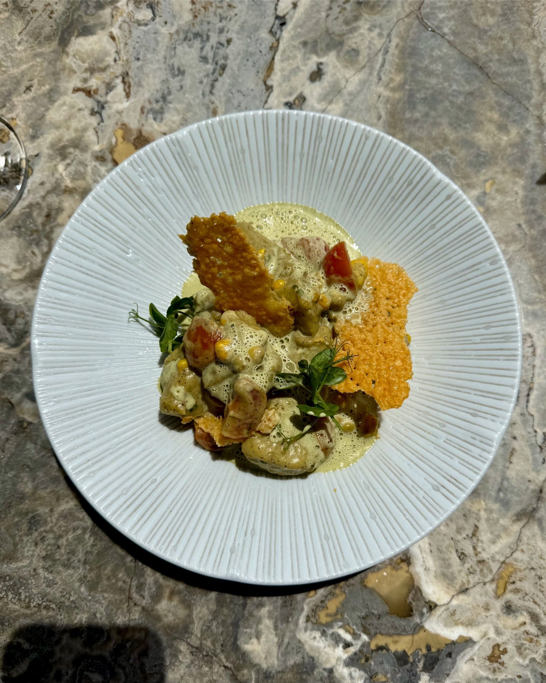 Pan-seared gnocchi with sweetcorn, zucchini basil purée and Parmesan crisp at Grub & Vine Norval, sunshine in a bowl